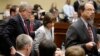 Director of Exempt Organizations for the Internal Revenue Service Lois Lerner (C) departs with her legal team after being excused from a House Oversight and Government Reform Committee hearing on targeting of political groups seeking tax-exempt status fro