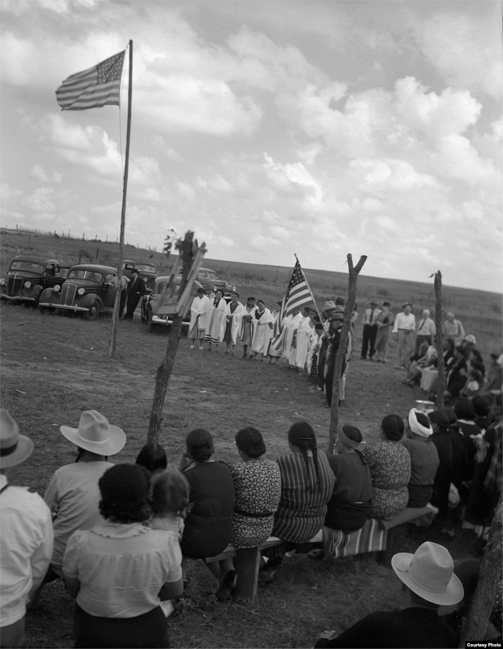 Powwow at Lone Bear’s dance ground. Carnegie, Oklahoma, ca. 1945. 45POW55. © 2014 Estate of Horace Poolaw. Reprinted with permission.