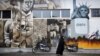 Anti-U.S. graffiti painted on the walls of the former U.S. Embassy in Tehran, Iran, Nov. 2, 2013. 