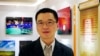 Yu Qiyi poses for a photo at an exhibition held at a hotel in Beijing, Sept. 2, 2012. 