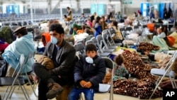 AQShning Germaniyadagi "Ramshtayn" harbiy-havo bazasiga keltirilgan afg'on qochqinlari