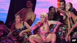 FILE - Nicki Minaj performs during the MTV EMA's 2018 at Bilbao Exhibition Centre, Nov. 4, 2018, in Bilbao, Spain. 