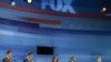 Republican presidential candidates gather prior to a debate, in Orlando, Florida, September 22, 2011.
