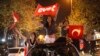Supporters of the "Yes" vote, wave flags during celebrations in Istanbul, on Sunday, April 16, 2017.