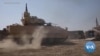 Islamic State in Iraq, Syria Down but Not Out, Analysts Say