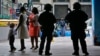 A New York Police Department anti-terror unit guard an entry area to Madison Square Garden as families arrive for a graduation ceremony, May 23, 2017, in New York. 