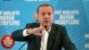 Turkey's President Recep Tayyip Erdogan gestures as he delivers a speech at his ruling political party's conference in Afyonkarahisar province in western Turkey, Oct. 7, 2017. Erdogan has announced the country is conducting a "serious" operation against extremist groups in Syria's northwestern Idlib province with Turkey-backed rebels.