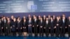 Heads of State and government pose for a group photo at an EU summit in Brussels, Feb. 12, 2015. 