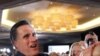 Republican presidential candidate, former Massachusetts Gov. Mitt Romney, greet supporters at his Super Tuesday primary night rally in Boston, Tuesday, March 6, 2012. 