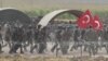 Turkish and Iraqi troops participate in a joint military exercise near the Turkish-Iraqi border in Silopi, Turkey, Sept. 26, 2017. 