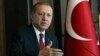 Turkey's President Recep Tayyip Erdogan, delivers a speech during a meeting in Ankara, Oct. 5, 2017. Erdogan has suggested that Turkey, Iran and Iraq are considering blockading Iraq's semi-autonomous region by closing their airspace and borders.