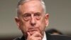 FILE - Defense Secretary Jim Mattis listens while testifying on Capitol Hill in Washington, June 13, 2017, before a Senate Armed Services Committee hearing on the defense department's budget. 