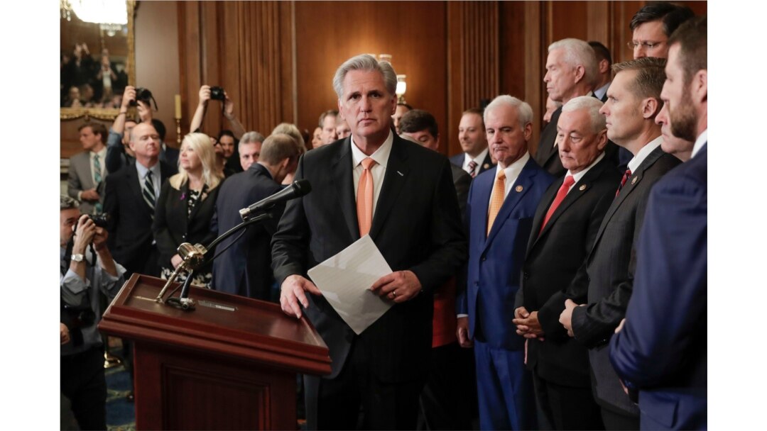 FILE - House Minority Leader Kevin McCarthy of California, center, is joined by fellow Republican lawmakers as he walks to the podium to begin speaking during a news conference on Capitol Hill in Washington, Oct. 31, 2019.