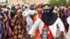 A Tuareg man dances at a campaign rally for presidential candidate Ibrahim Boubacar Keita in Timbuktu, Mali, July 24, 2013.