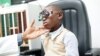 Lemuel Tebuck, now 8 years old, with aligned eyes from strabismus surgery, undergoes a regular check-up at Yaoundé Central Hospital, Yaoundé, Cameeroon, April 2016.