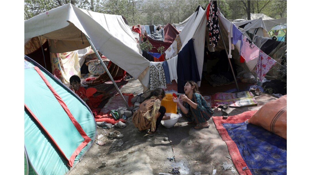 Internally displaced Afghans from northern provinces, who fled their home due to fighting between the Taliban and Afghan security personnel, take refuge in a public park Kabul, Afghanistan, Aug. 13, 2021.
