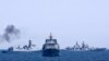FILE - Chinese and Russian naval vessels are seen during a 2014 joint naval exercise outside Shanghai on the East China Sea.