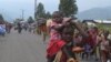 Displaced families flee renewed fighting between the Congolese Revolutionary Army (CRA) and Congolese army in Mugunga, near Goma, November 22, 2012. 