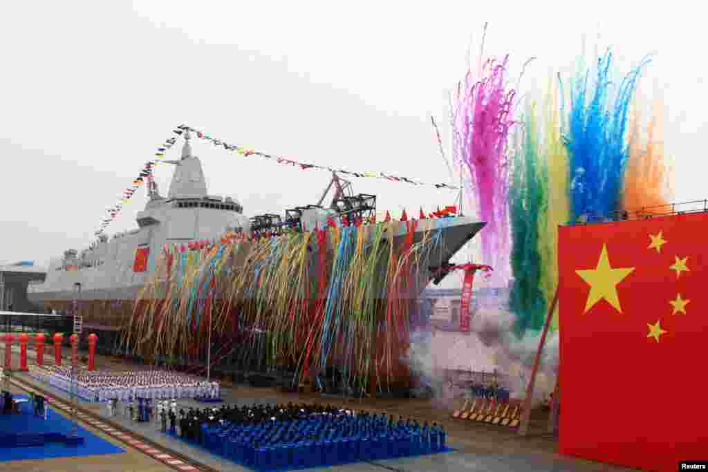 China's new type of domestically-built destroyer, a 10,000-tonne warship, is seen during its launching ceremony at the Jiangnan Shipyard in Shanghai, China.