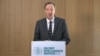 MI6 chief Alex Younger speaks at MI6's Vauxhall Cross headquarters in central London, in this still image from video, Dec. 8, 2016. Younger said Britain and Western nations are facing grave threats to their security and political systems from hostile propaganda output and cyber attacks. 