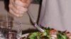 Robert Keeling enjoys a paleo stir-fry with shrimp, broccoli, mushrooms and yams.